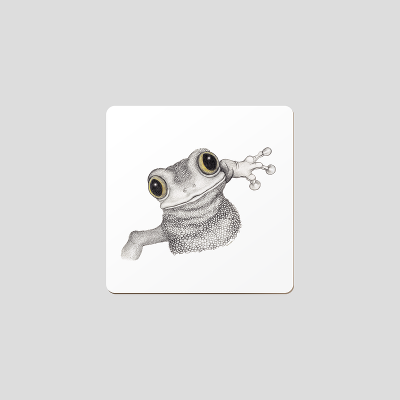 Drawing of a frog with a white background on a coaster. 
